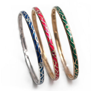 gold bangle with Ruby set in Great wave 