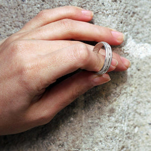 Hand and Silver double twist unisex commitment ring