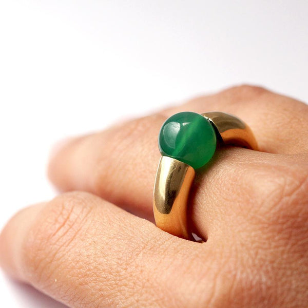 Green solitaire with rose gold combination ring donut
