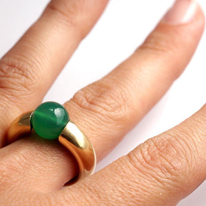 Green solitaire with rose gold combination ring donut