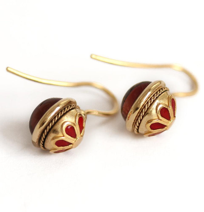 Vintage looking earrings with a red Cornelian stone ball
