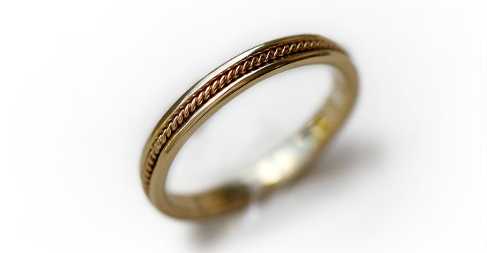 yellow gold twist male wedding band with braided filigree
