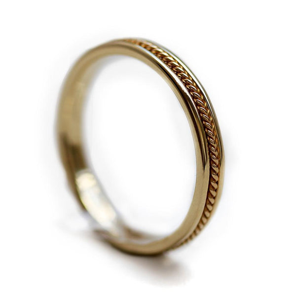 yellow gold twist male wedding band with braided filigree