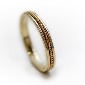 yellow gold twist male wedding band with braided filigree