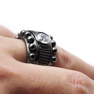 Cadi handcrafted Donut cocktail ring for women featuring a bold round black sphere stone in a smooth, sculptural band.