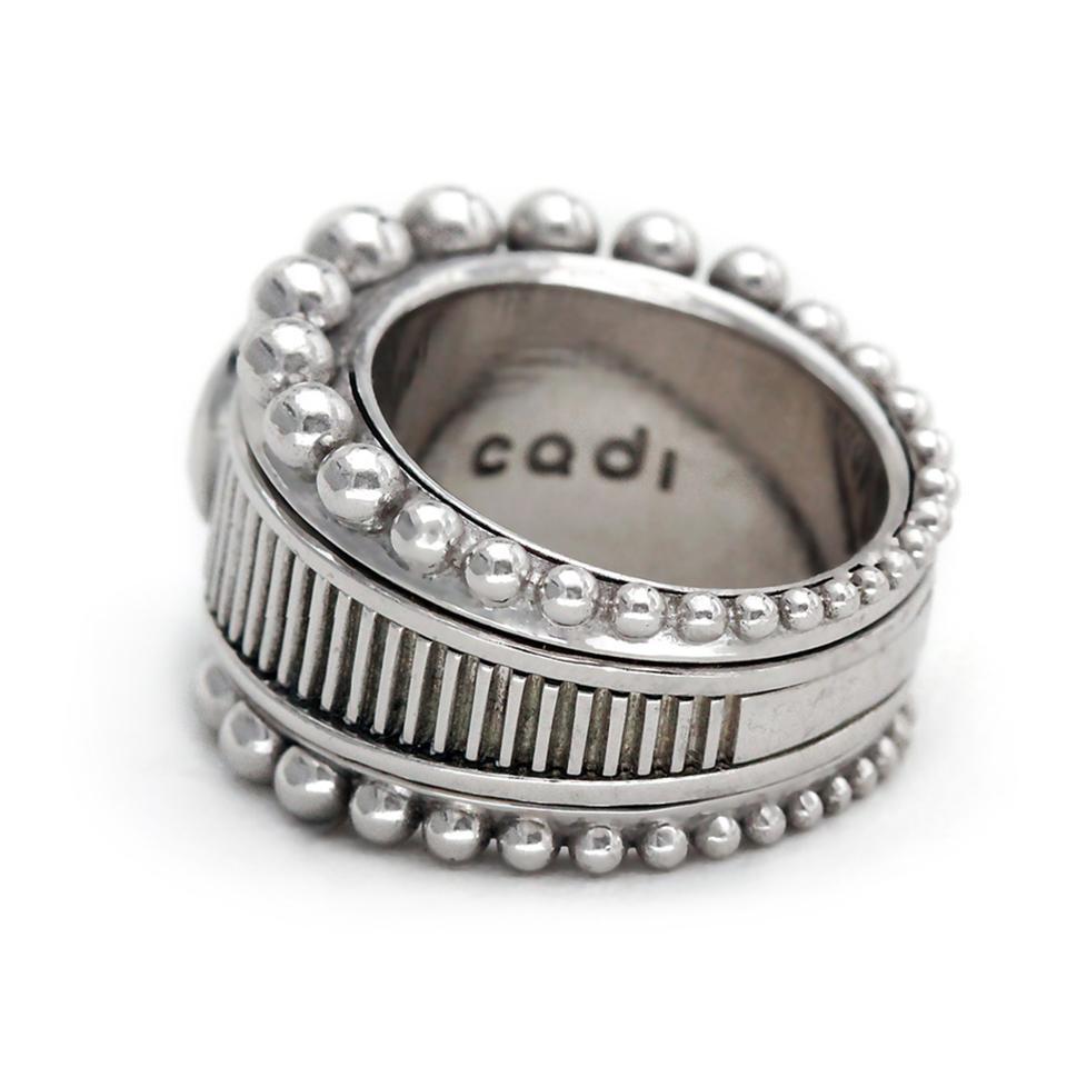 texture silver or gold ring with natural white Topaz stone