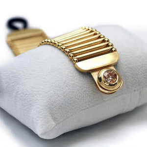 Yellow Cubic Zirconia Gemstone in gold bracelet