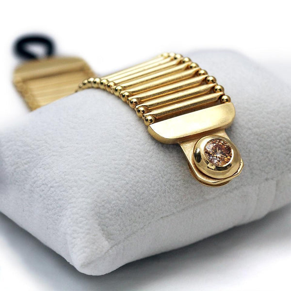 Yellow Cubic Zirconia Gemstone in gold bracelet