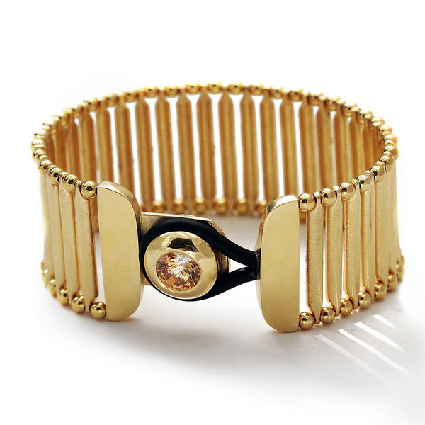 Yellow Cubic Zirconia Gemstone in gold bracelet