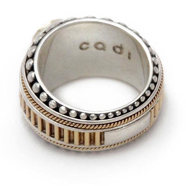 Cadi handcrafted Donut cocktail ring with a bold round sphere stone in a smooth, rounded band; “cadi” engraved inside.