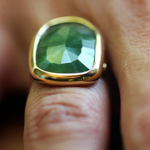 irregular natural green Emerald gem on yellow gold roca ring