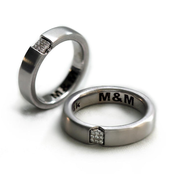 Pair of solid gold matching diamond couple rings