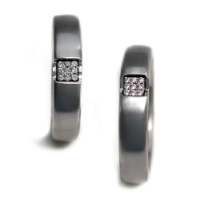 Pair of solid gold matching diamond couple rings
