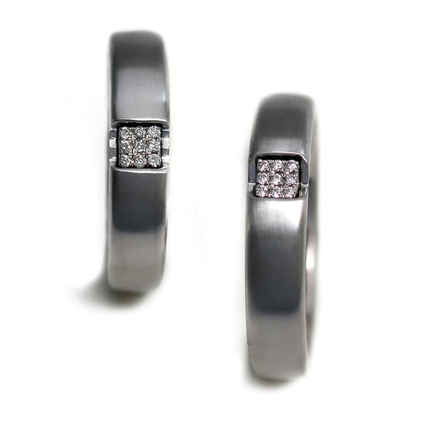 Pair of solid gold matching diamond couple rings
