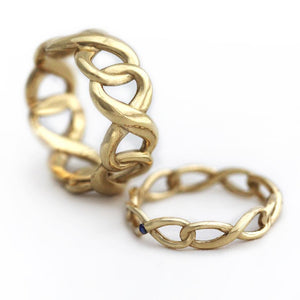 gold set of his and hers promise rings with infinity shape