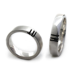 silver ring set engraved with your own initials