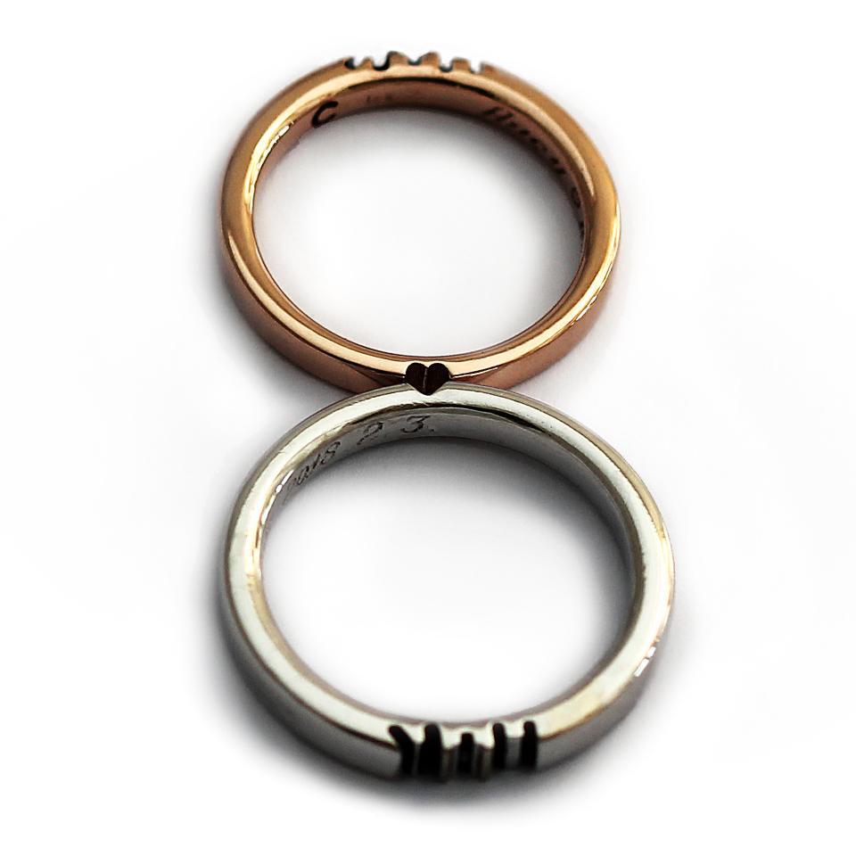 rose gold and silver promise ring set engraved with initials