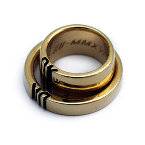 gold ring set engraved with your own initials