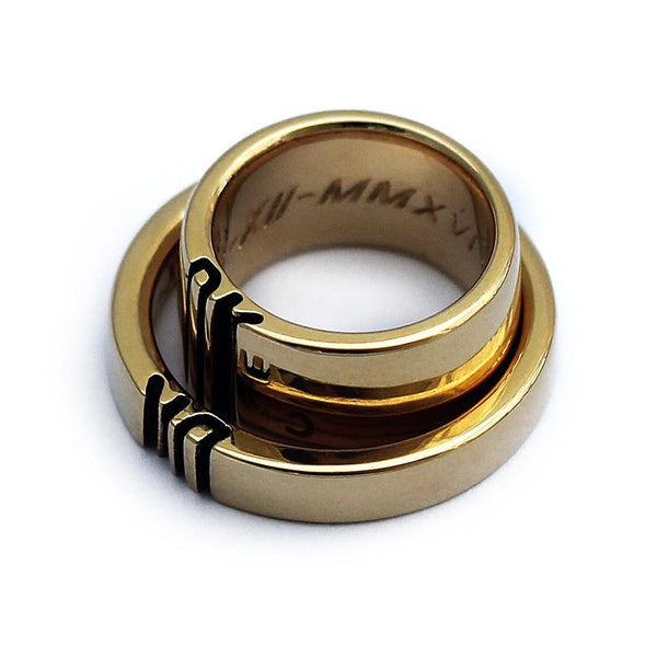 gold ring set engraved with your own initials