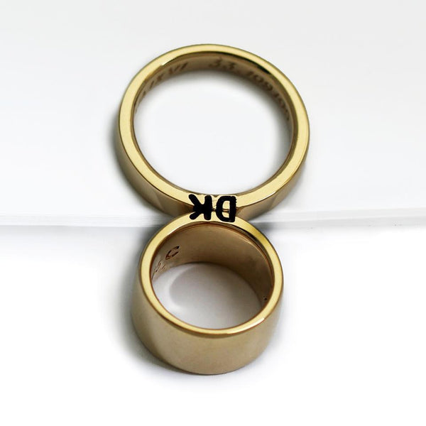 gold ring set engraved with your own initials