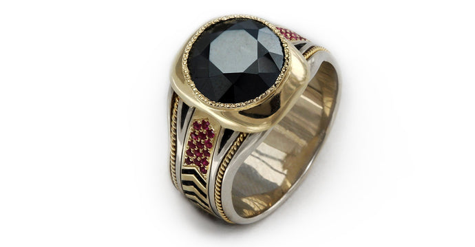black Spinel gemstone on yellow and white gold with red Rubies ring