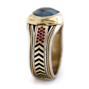 black Spinel gemstone on yellow and white gold with red Rubies ring