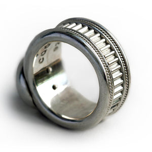 Man's silver misti wedding band with garnet