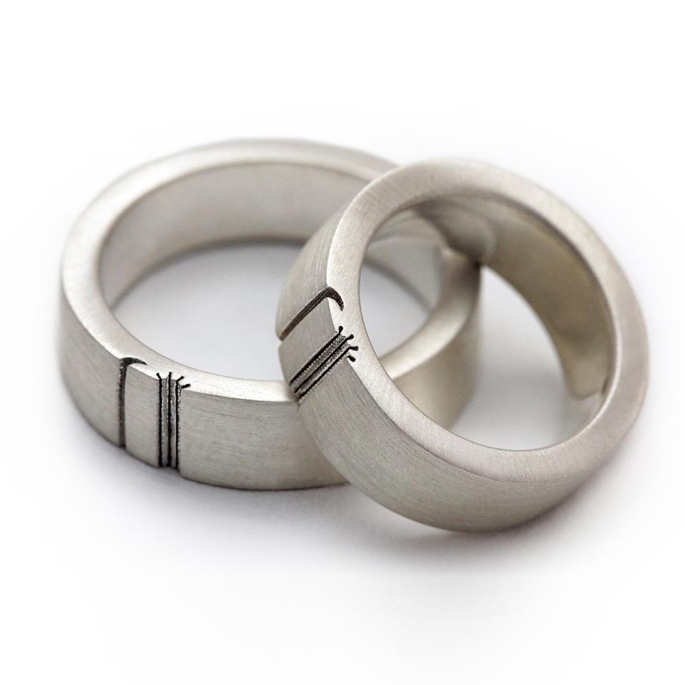 Matching handcrafted sun and moon promise wedding engagement rings