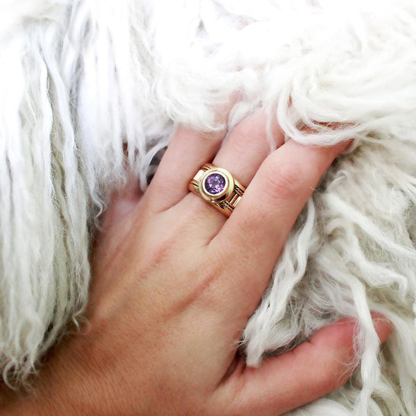 Purple Amethyst gemstone set in a gold Misti ring