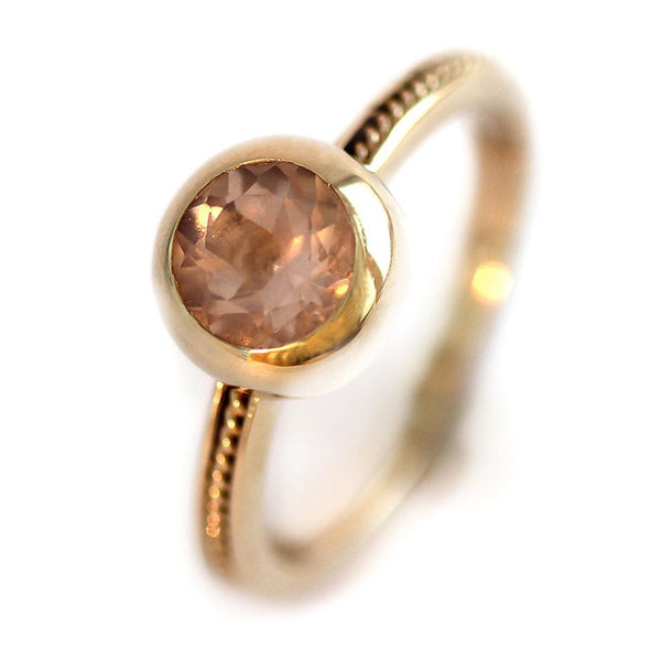 pink solitaire engagement ring made in gold or sterling silver