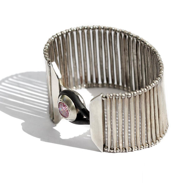 Pink Cubic Zirconite gemstone set in flexi silver bracelet
