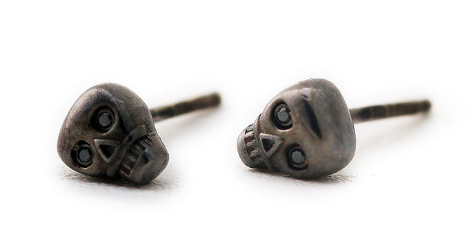 black skull with black Diamond eyes plated in gold or silver earrings