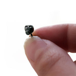 black skull with black Diamond eyes plated in gold or silver earrings