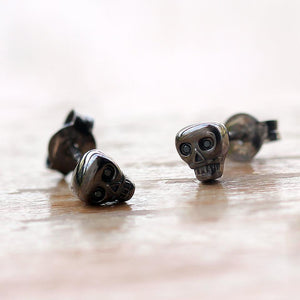 black skull with black Diamond eyes plated in gold or silver earrings