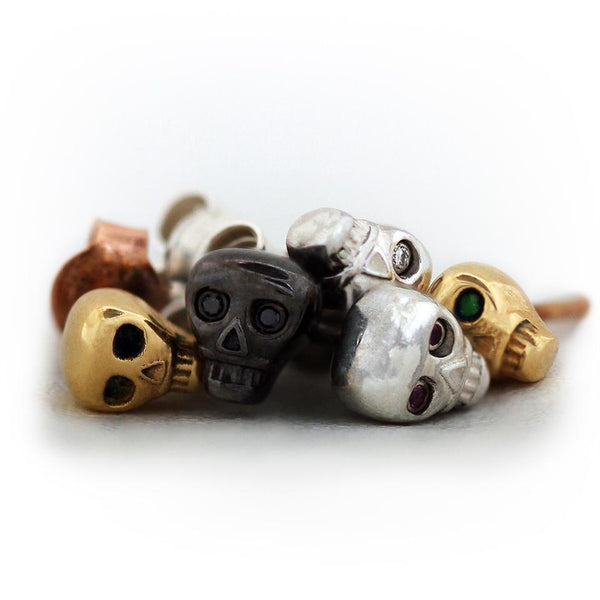 black skull with black Diamond eyes plated in gold or silver earrings