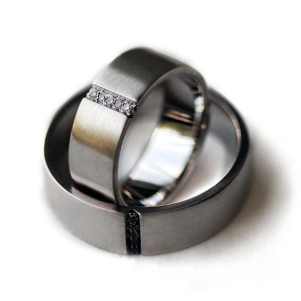 Pair of couples matching black and white Diamond engagement rings