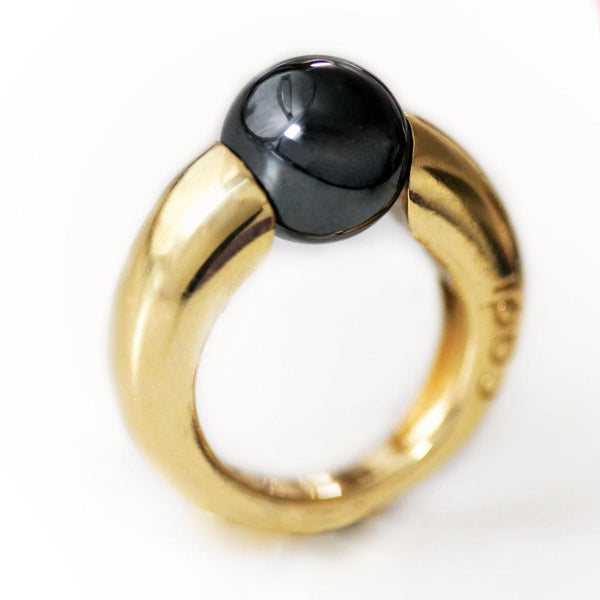 fashion statement ring with a simple but sufisticaited design using big round Black Hematite with gold ring