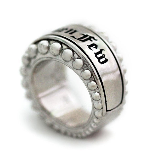 Cadi donut cocktail ring for women with bold round onyx sphere set in smooth 925 sterling silver sculptural band, Gothic engraved text.