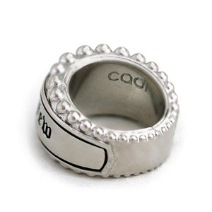 gold or silver tone backdrop with rich Gothic font Hip hop jewelry