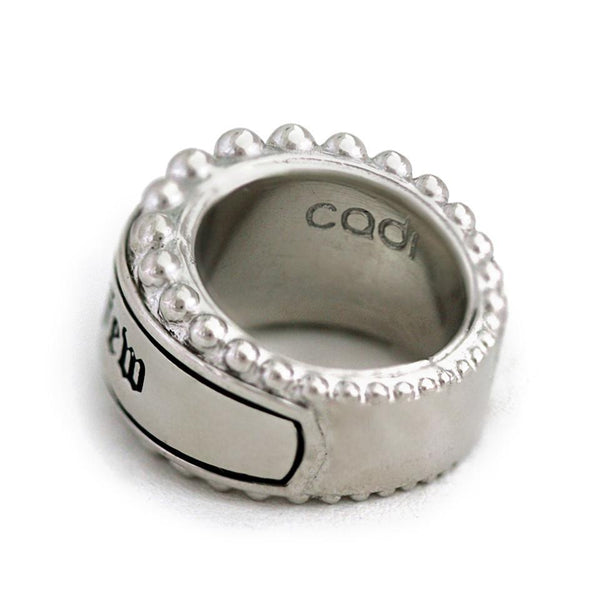 gold or silver tone backdrop with rich Gothic font Hip hop jewelry