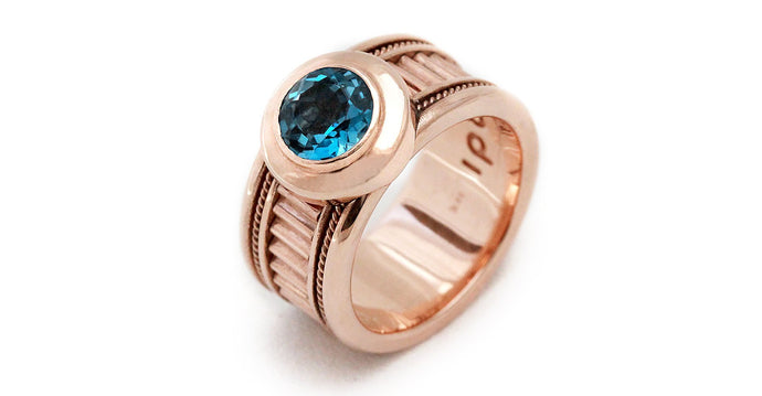 rose-gold sparkling blue Topaz