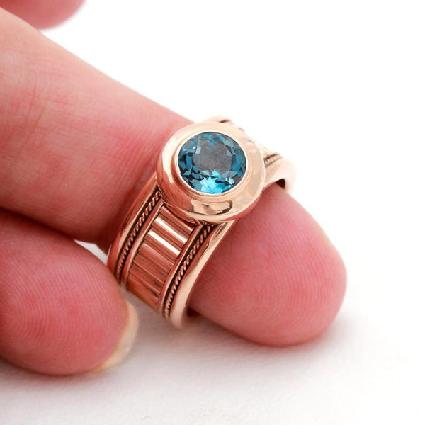 rose-gold sparkling blue Topaz