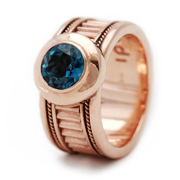rose-gold sparkling blue Topaz