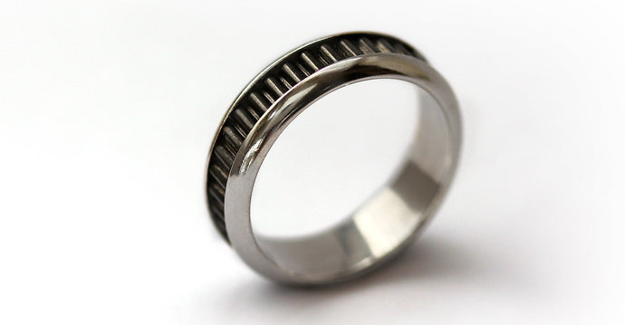 Coil black designer promise ring for couples