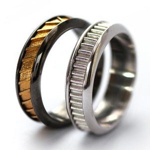 Coil indented handmade silver and black his and her couple rings