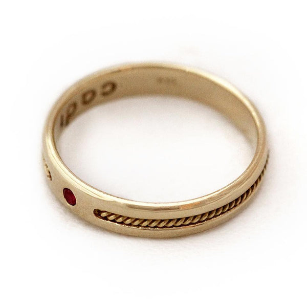 Tribal style gold with ruby Twist promise ring
