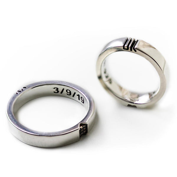 silver promise ring set engraved with initials filled with diamonds