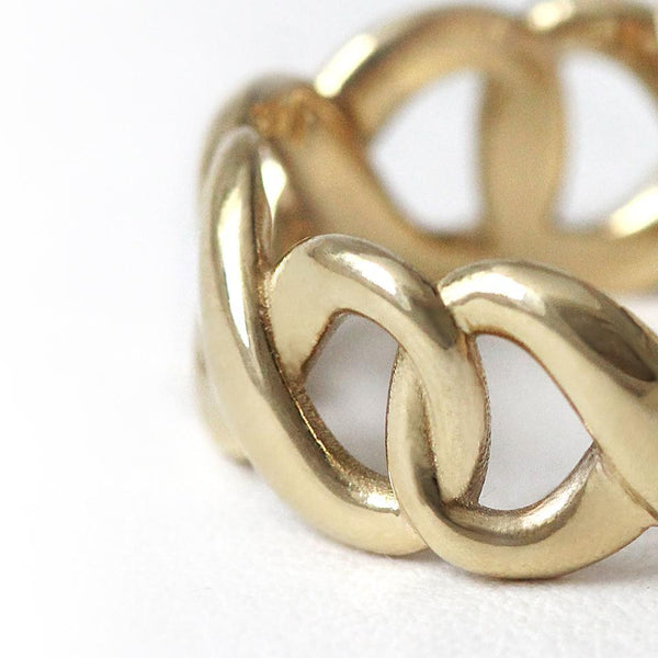 Wedding gold ring with wider infinity