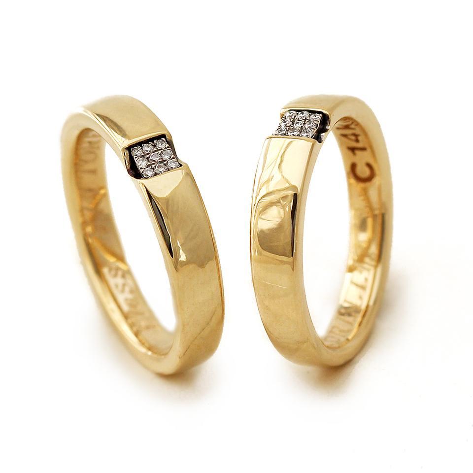 Gold matching promise bands with diamonds for couples Cadi Jewelry